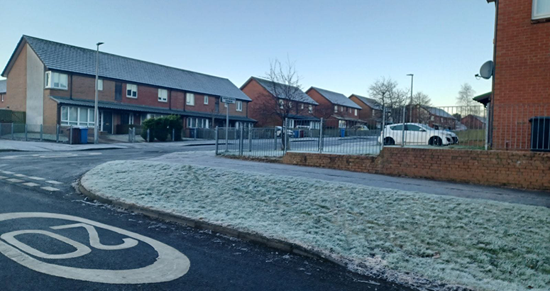 A street of modern red brick houses in Dundee