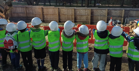 A Beaver Scouts group is shown visiting the site