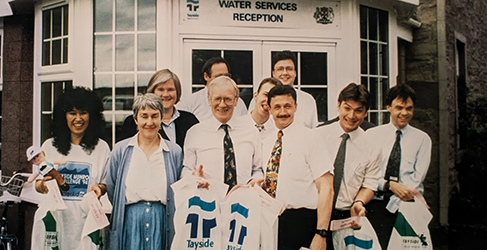 historic image of Mountaineer Tom Millar with a group who founded the Munro Challenge for WaterAid
