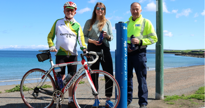 Alasdair Washington, Emily Kearl and Ellis Mackay at the new Top Up Tap in Thurso