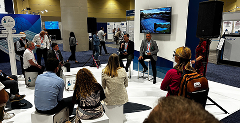 Scottish Water CEO Alex Plant talking in front of a crowd at the IWA World Water Congress in Toronto in 2024