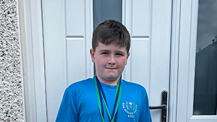 Young Learn to Swim student Callan Johnston head and shoulders